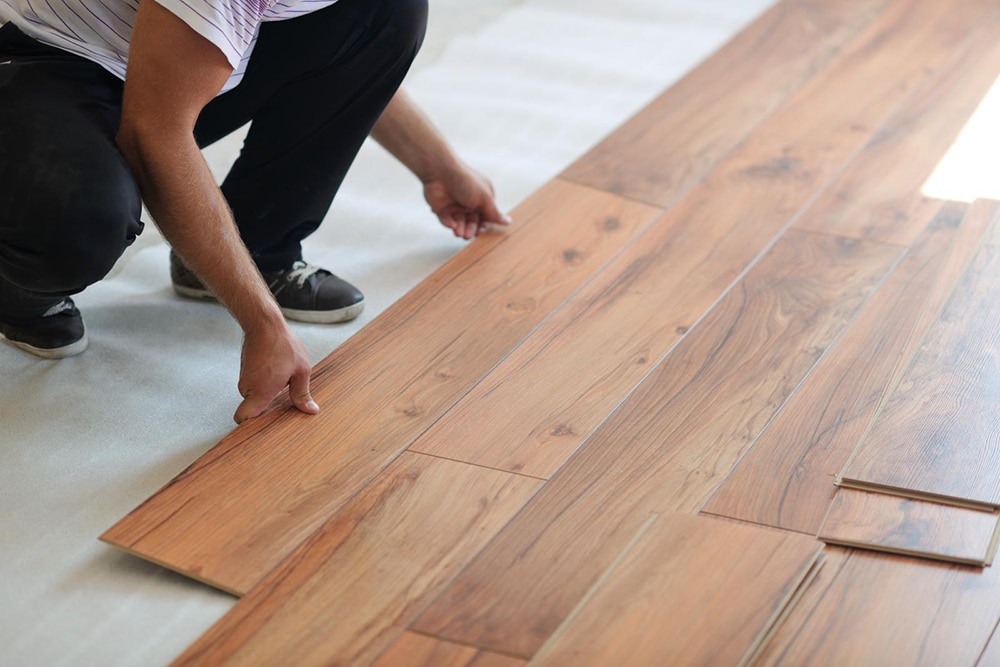 Installing laminate flooring in new home indoor