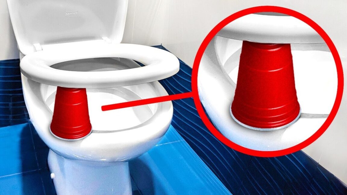 Why People Are Placing A Red Cup Under Their Toilet Seat At Night (And